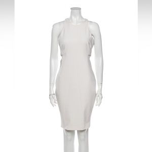 Elizabeth and James knee length dress with side cutouts.